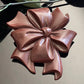 Vintage Brown Early Plastic Ribbon Bow Brooch