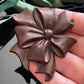 Vintage Brown Early Plastic Ribbon Bow Brooch
